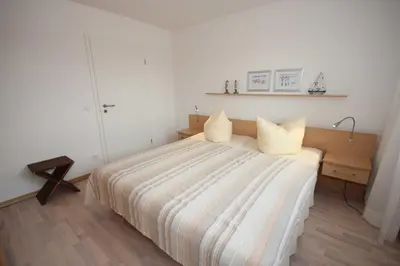 Ein Bett oder Betten in einem Zimmer der Unterkunft Käptn Brass App 8