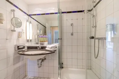 Ein Badezimmer in der Unterkunft Aparthotel 