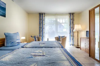 Ein Bett oder Betten in einem Zimmer der Unterkunft FH Luisenlund im Ostseebad Prerow