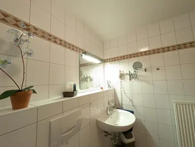 Ein Badezimmer in der Unterkunft Oewern Diek 23