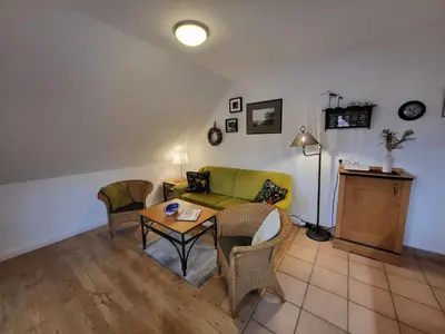 Ein Sitzbereich in der Unterkunft Oewern Diek 36