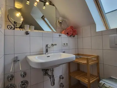 Ein Badezimmer in der Unterkunft Oewern Diek 36