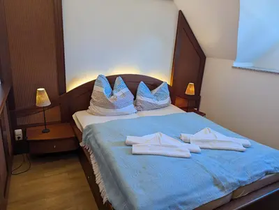Ein Bett oder Betten in einem Zimmer der Unterkunft Hengstmanns Ferienwohnung