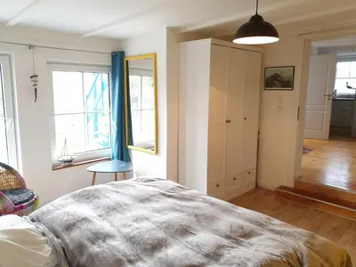 Ein Bett oder Betten in einem Zimmer der Unterkunft Ferienhaus Bredow