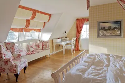 Ein Bett oder Betten in einem Zimmer der Unterkunft Landhaus Kranichblick