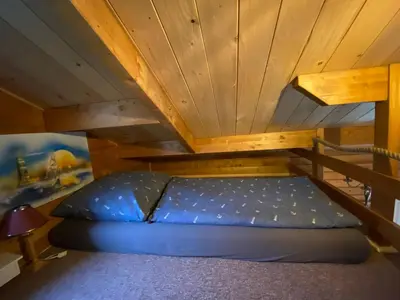 Ein Bett oder Betten in einem Zimmer der Unterkunft Schwalbennest