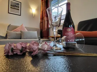 Ein Sitzbereich in der Unterkunft Haus zum Strand 2 4