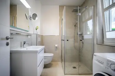 Ein Badezimmer in der Unterkunft Traumhaus Auri in Prerow Ostsee auf dem Darß mit Kamin und Sauna und Garten