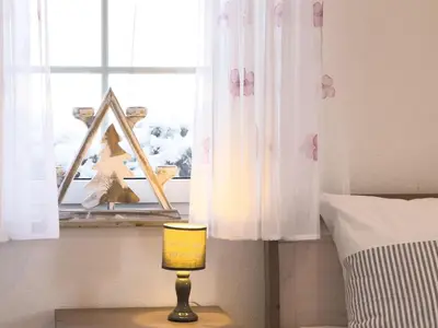 Ein Bett oder Betten in einem Zimmer der Unterkunft Inselperle Whg 1