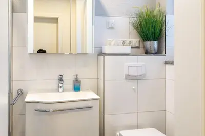 Ein Badezimmer in der Unterkunft Sonnenglebbe 38a