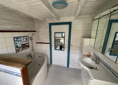 Ein Badezimmer in der Unterkunft Ostseehaus am Wasser