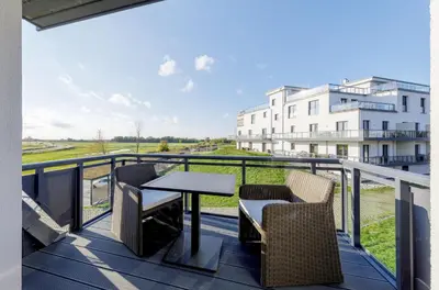 Ein Balkon oder eine Terrasse in der Unterkunft Moderne 5-Sterne-Ferienwohnung 