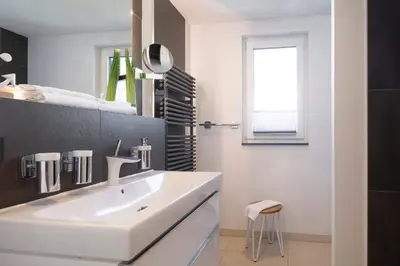Ein Badezimmer in der Unterkunft 5 Sterne Ferienwohnung Seesinn