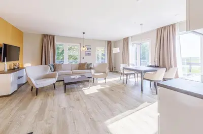 Ein Sitzbereich in der Unterkunft 5 Sterne Ferienwohnung Seezeit