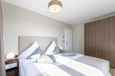 Ein Bett oder Betten in einem Zimmer der Unterkunft 5 Sterne Ferienwohnung Seezeit
