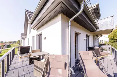Ein Balkon oder eine Terrasse in der Unterkunft 5 Sterne Ferienwohnung Seezeit