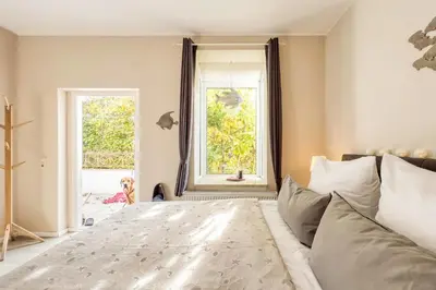 Ein Bett oder Betten in einem Zimmer der Unterkunft Villa Mare Whg 5