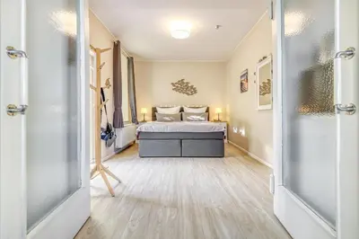 Ein Bett oder Betten in einem Zimmer der Unterkunft Villa Mare Whg 5