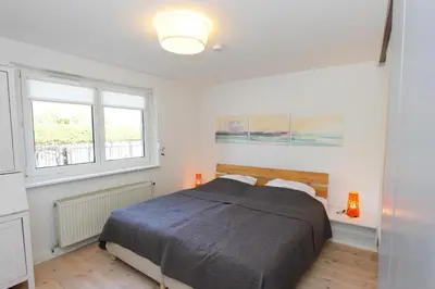 Ein Bett oder Betten in einem Zimmer der Unterkunft Gartendiele