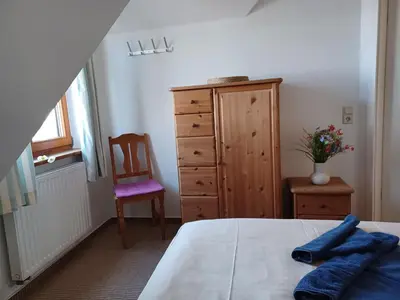 Ein Bett oder Betten in einem Zimmer der Unterkunft Strandhaus Jonathan 3