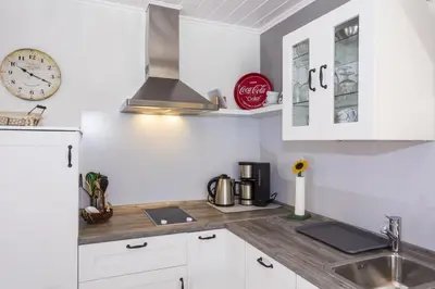 Küche/Küchenzeile in der Unterkunft Ostseeliebe, gemütliche und moderne Ferienwohnung für 2 Personen in Zingst