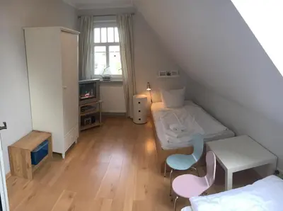 Ein Sitzbereich in der Unterkunft Hus Störtebeker, familienfreundliches Ferienhaus für 6 Personen in Zingst