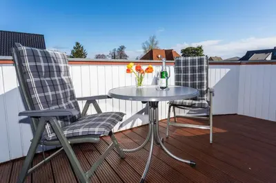 Ein Balkon oder eine Terrasse in der Unterkunft Seestern, gemütliche und moderne Ferienwohnung für 2 Personen in Zingst