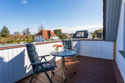 Ein Balkon oder eine Terrasse in der Unterkunft Seestern, gemütliche und moderne Ferienwohnung für 2 Personen in Zingst