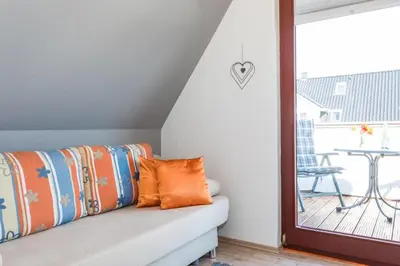 Ein Balkon oder eine Terrasse in der Unterkunft Seestern, gemütliche und moderne Ferienwohnung für 2 Personen in Zingst