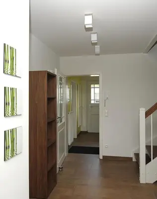 Ein Bett oder Betten in einem Zimmer der Unterkunft Godehus 6, exquisites Ferienhaus für 6 Personen in Zingst