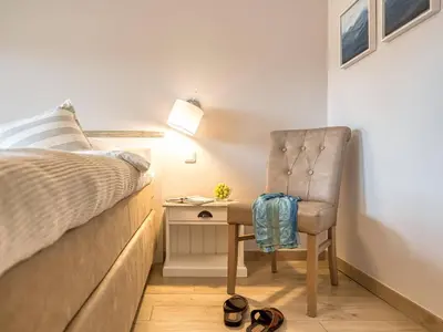 Ein Bett oder Betten in einem Zimmer der Unterkunft MorgenSuenn, exquisite Ferienwohnung für 2 Personen in Zingst