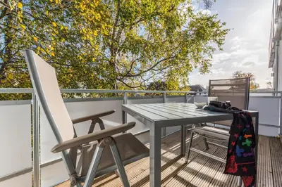 Ein Balkon oder eine Terrasse in der Unterkunft MorgenSuenn, exquisite Ferienwohnung für 2 Personen in Zingst