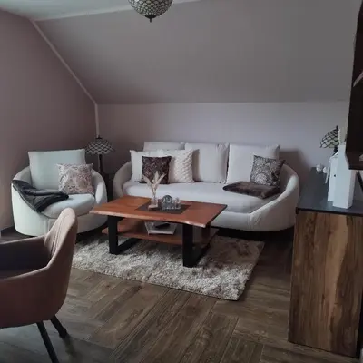 Ein Sitzbereich in der Unterkunft Smile, exclusive Ferienwohnung für 4 Personen in Zingst