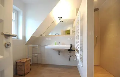 Ein Badezimmer in der Unterkunft Godehus 4, exquisite Ferienwohnung für 4 Personen in Zingst