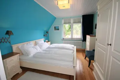 Ein Bett oder Betten in einem Zimmer der Unterkunft Ferienwohnung Sonnensuite
