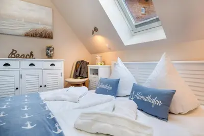 Ein Bett oder Betten in einem Zimmer der Unterkunft Seebrise Zingst