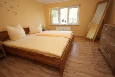 Ein Bett oder Betten in einem Zimmer der Unterkunft Haus 1795 Sperber