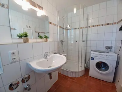 Ein Badezimmer in der Unterkunft An den Boddenwiesen III