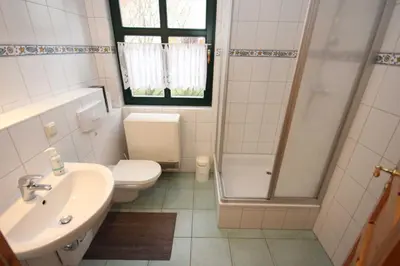 Ein Badezimmer in der Unterkunft Am Deich Strandhaus EG