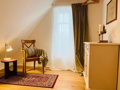 Ein Sitzbereich in der Unterkunft Ferienhaus Slichtemolen