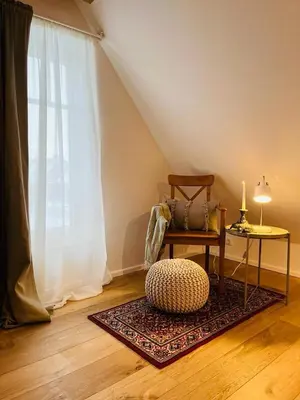 Ein Sitzbereich in der Unterkunft Ferienhaus Slichtemolen