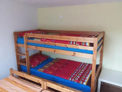 Ein Bett oder Betten in einem Zimmer der Unterkunft NEU Ferienhaus am Saaler Bodden