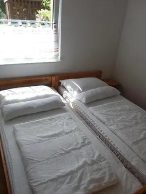 Ein Bett oder Betten in einem Zimmer der Unterkunft NEU Ferienhaus am Saaler Bodden