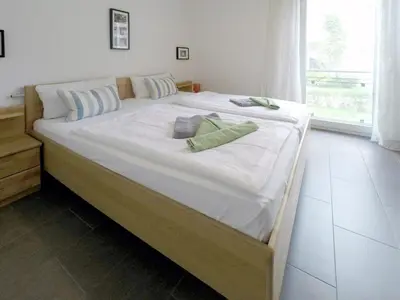 Ein Bett oder Betten in einem Zimmer der Unterkunft Ferienwohnung Pauline