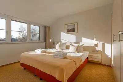 Ein Bett oder Betten in einem Zimmer der Unterkunft 2 Raum Ferienwohnung Ostseeperle Superior
