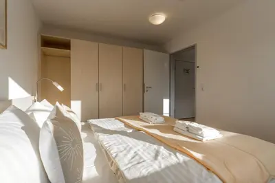 Ein Bett oder Betten in einem Zimmer der Unterkunft 2 Raum Ferienwohnung Ostseeperle Superior