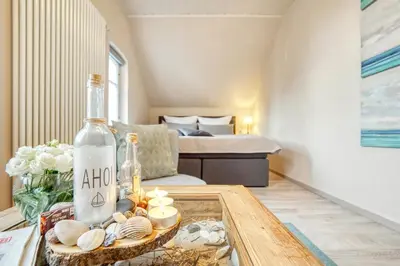 Ein Bett oder Betten in einem Zimmer der Unterkunft Villa Mare Whg6