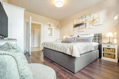Ein Bett oder Betten in einem Zimmer der Unterkunft Villa Mare Whg6