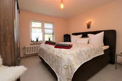 Ein Bett oder Betten in einem Zimmer der Unterkunft Ferienwohnung Krull