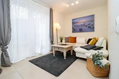 Ein Sitzbereich in der Unterkunft Haus Nastassja App 04